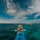 photo of man wearing rash guard