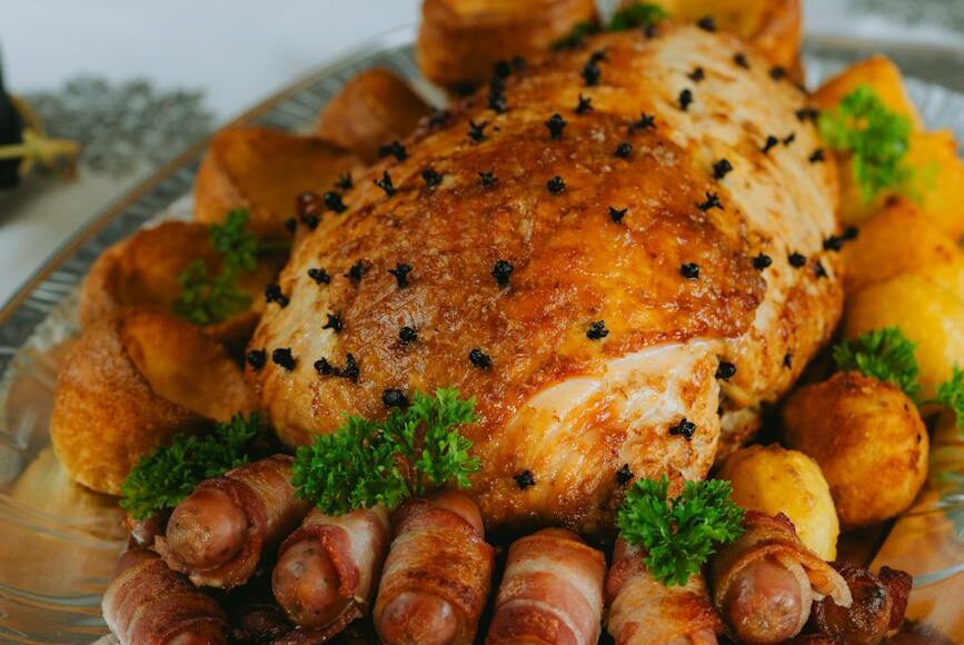 roasted meat on the table at a christmas dinner