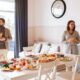 people standing near dining table