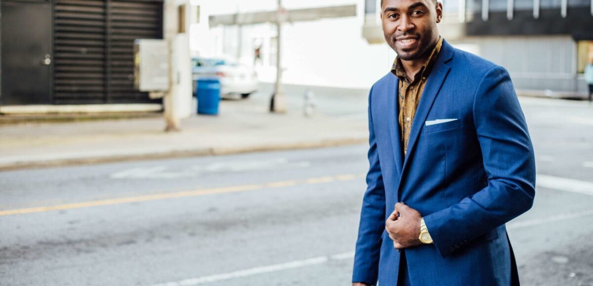 man wearing blue blazer