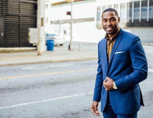 man wearing blue blazer