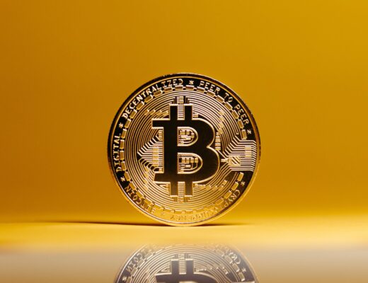 bitcoin on yellow studio background