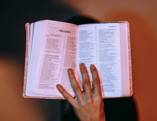 opened book in selective focus photography